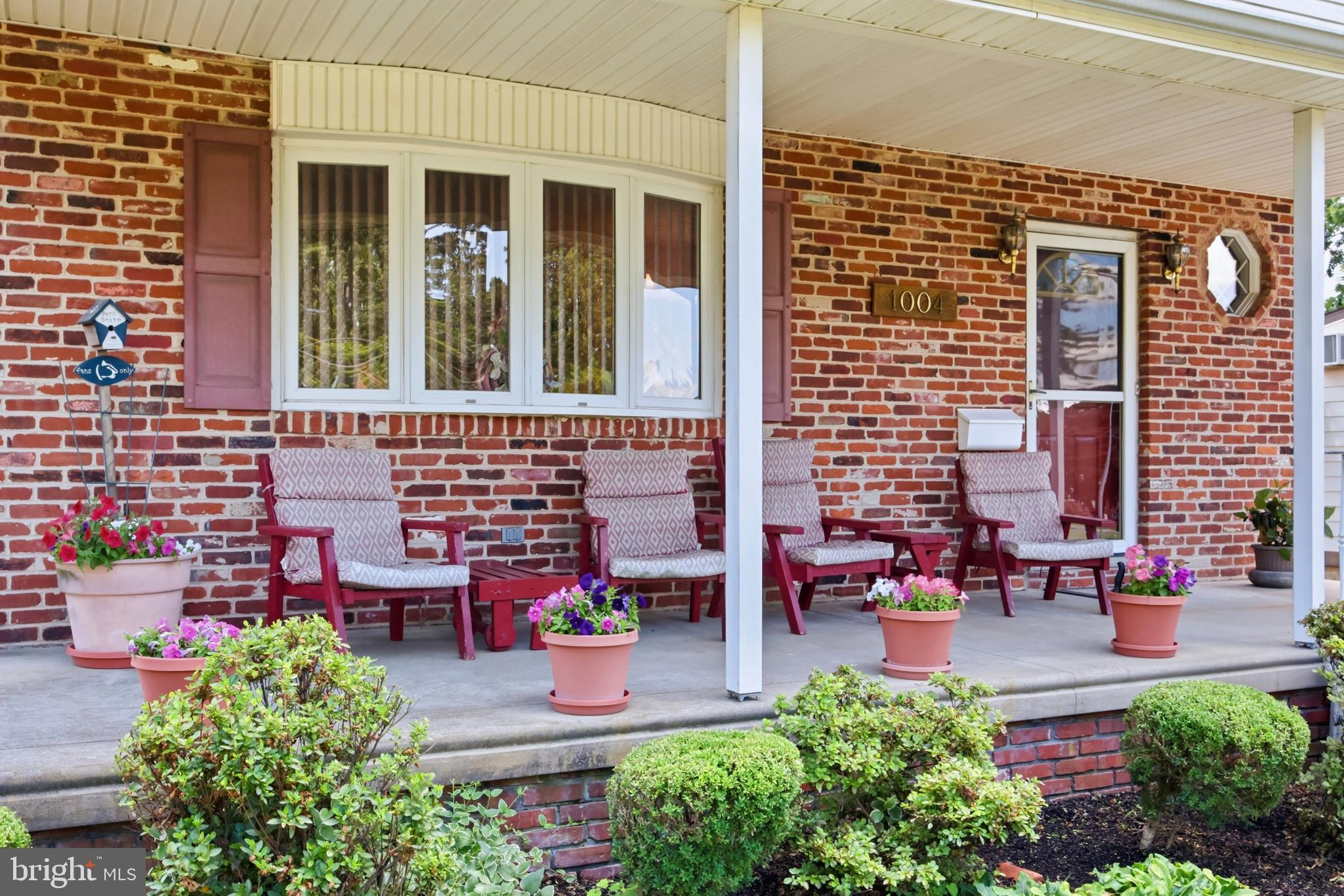 1004 Green Lane Secane, PA 19018 - Photo 5 of 49 a view of a patio with table and chairs and potted plants