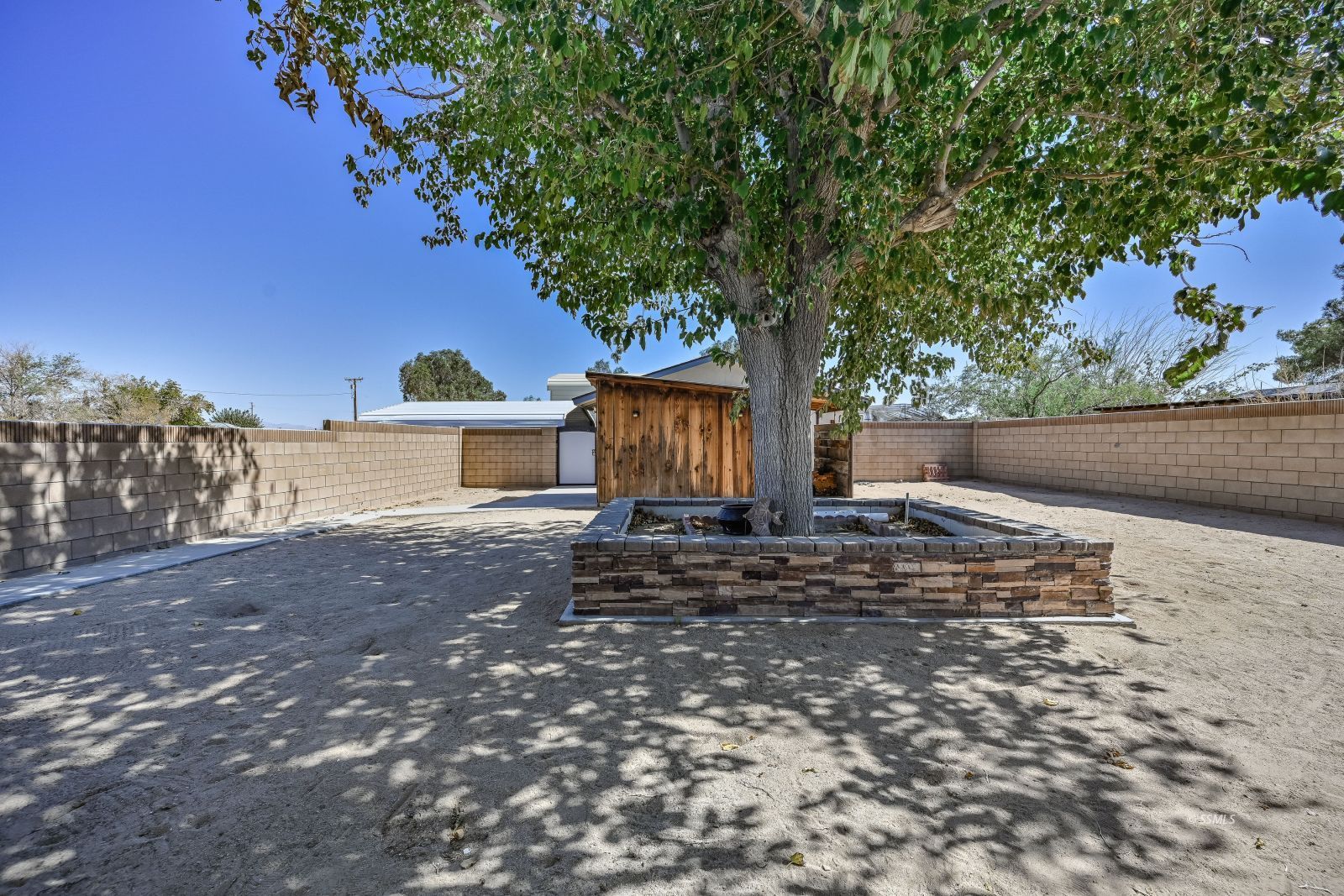 1572 North Calvert Boulevard Ridgecrest, CA 93555 - Photo 24 of 27 a view of a house with a yard