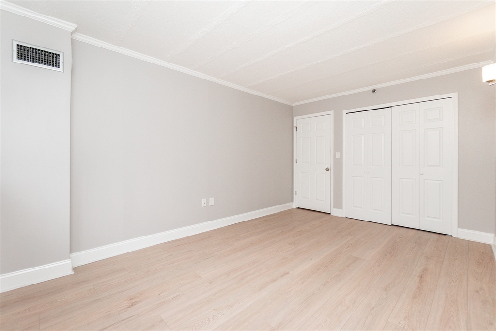 1933 Commonwealth Avenue, Unit 108 Boston, MA 02135 - Photo 15 of 27 a view of an empty room