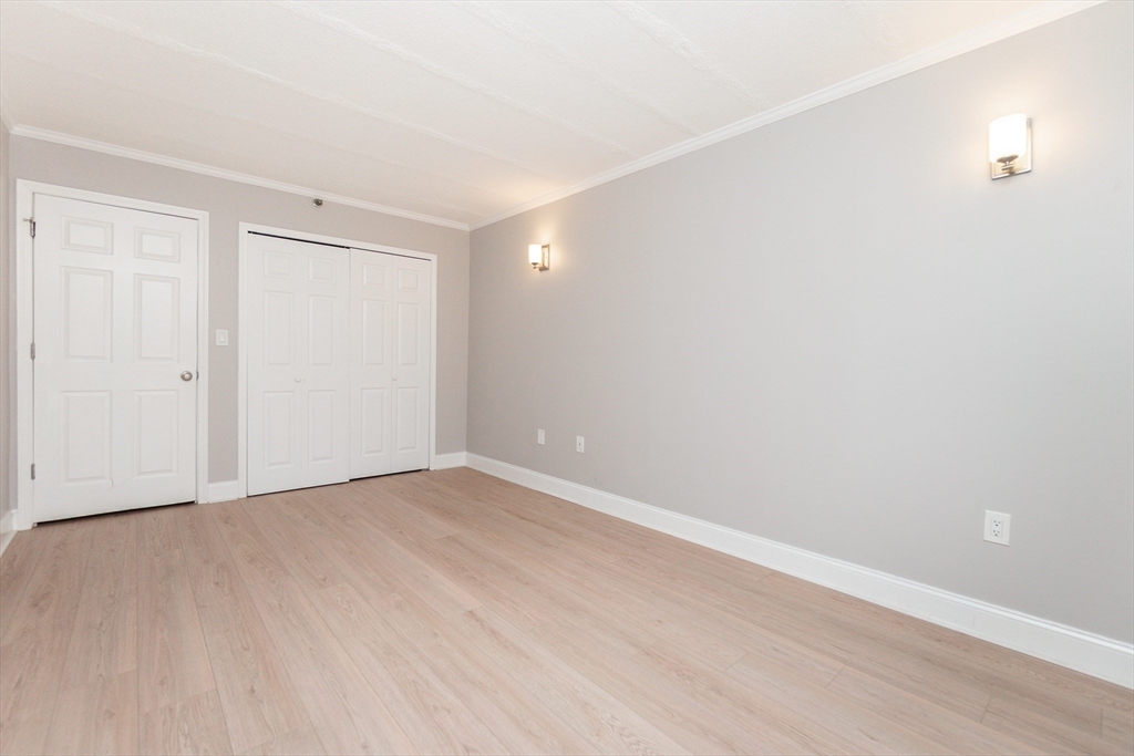 1933 Commonwealth Avenue, Unit 108 Boston, MA 02135 - Photo 16 of 27 a view of an empty room