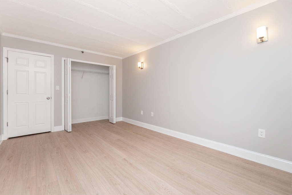 1933 Commonwealth Avenue, Unit 108 Boston, MA 02135 - Photo 18 of 27 a view of an empty room