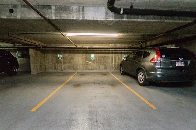 a room with gym equipment and a large window