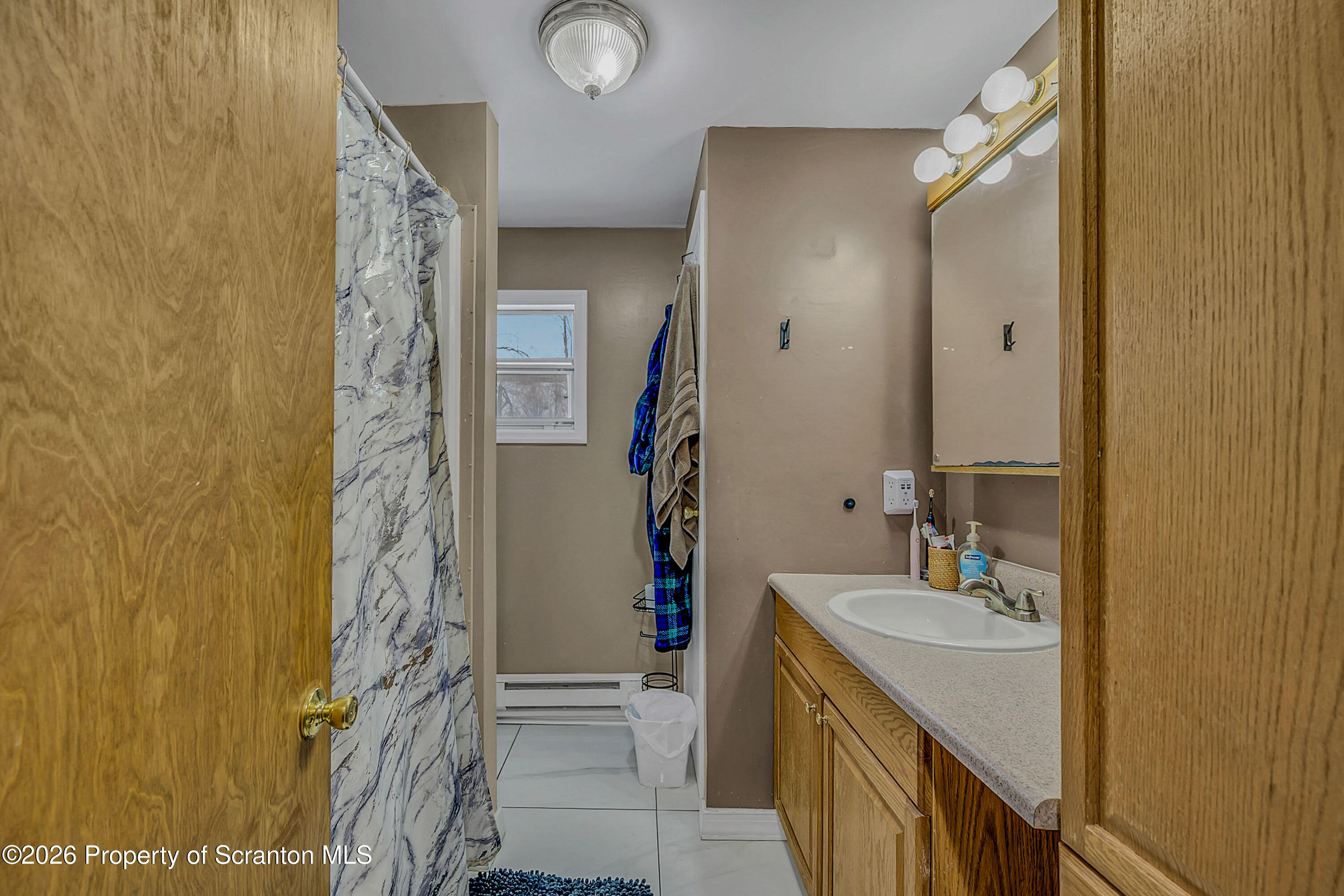 1114 Springbrook Avenue, Unit REAR Moosic, PA 18507 - Photo 26 of 32 Main Level Bathroom