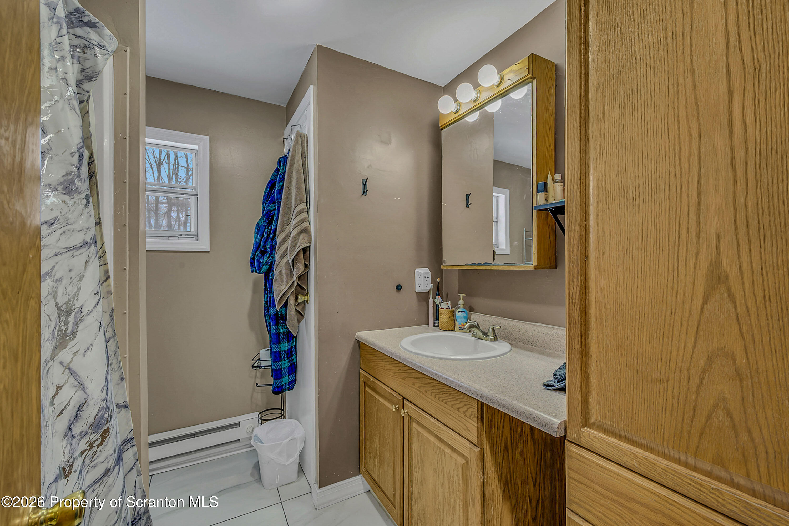 1114 Springbrook Avenue, Unit REAR Moosic, PA 18507 - Photo 4 of 32 Main Level Bathroom