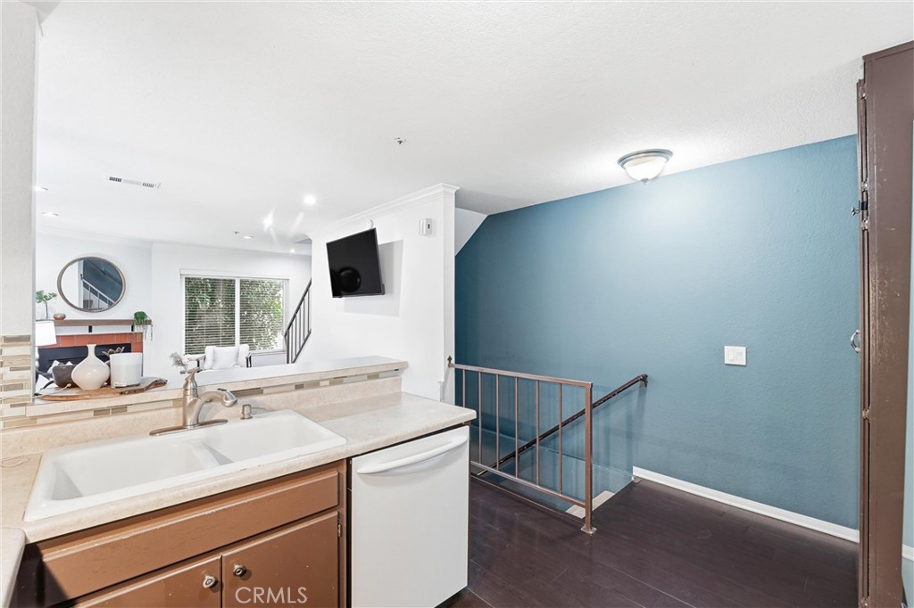 334 South Walnut Avenue, Unit D Brea, CA 92821 - Photo 12 of 32 a bathroom with a sink and a mirror