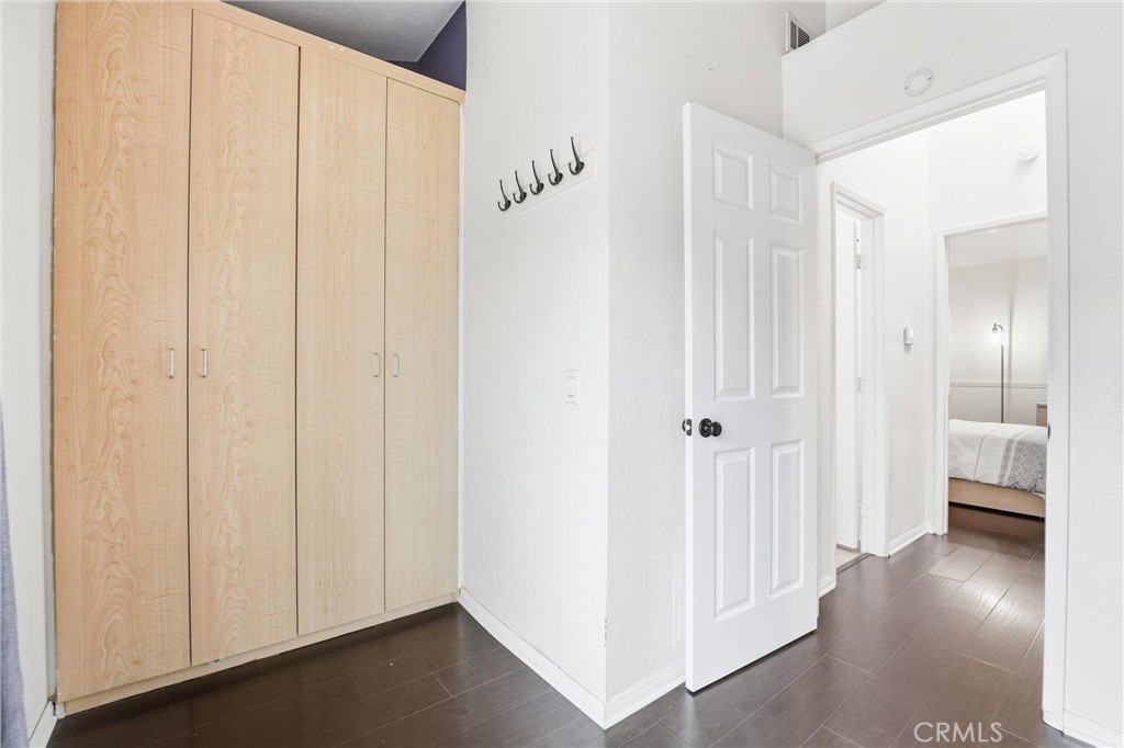 334 South Walnut Avenue, Unit D Brea, CA 92821 - Photo 24 of 32 a view of a hallway with wooden floor