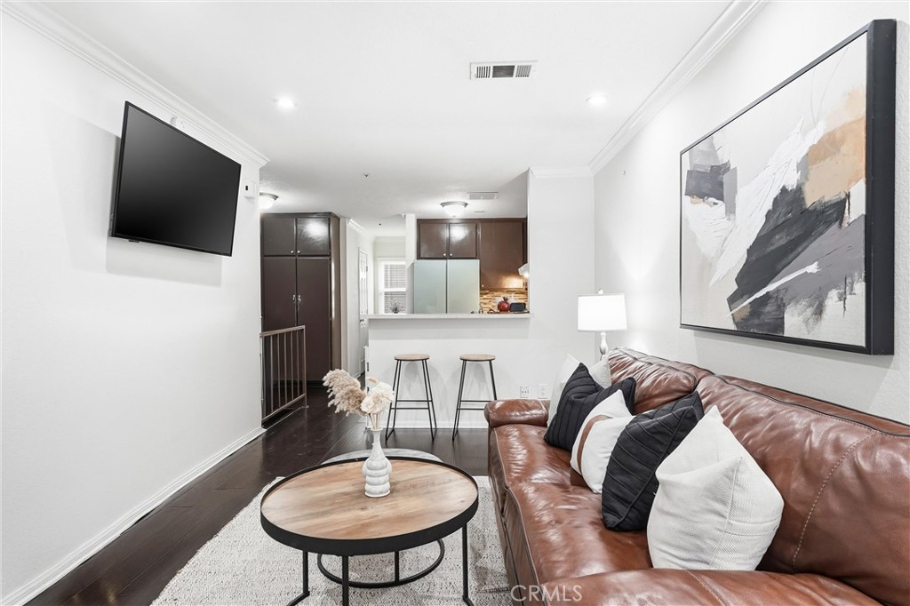 334 South Walnut Avenue, Unit D Brea, CA 92821 - Photo 5 of 32 a living room with furniture and a flat screen tv