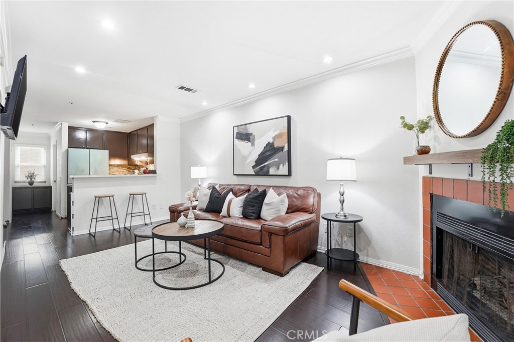 334 South Walnut Avenue, Unit D Brea, CA 92821 - Photo 6 of 32 a living room with furniture and a fireplace