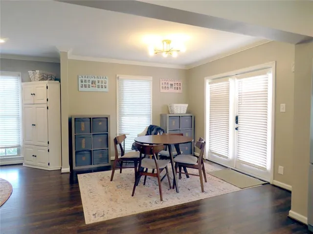 a living room with furniture fireplace and flat screen tv