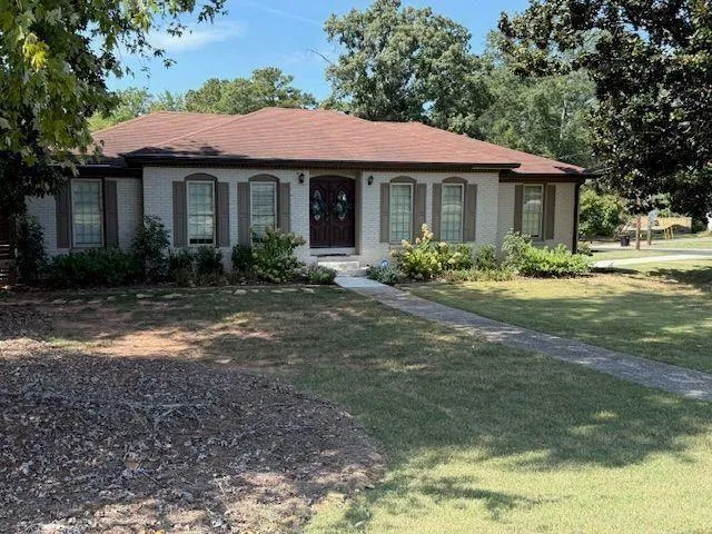a view of a house with swimming pool