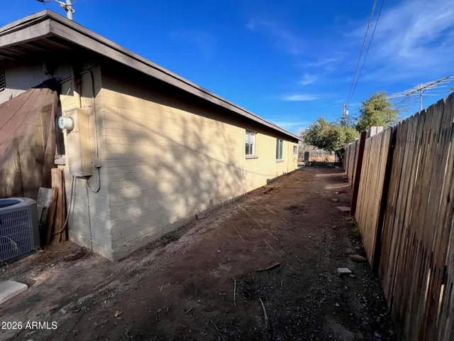 a view of a back yard of the house