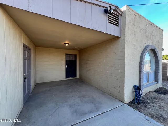 a view of a livingroom with a staircase