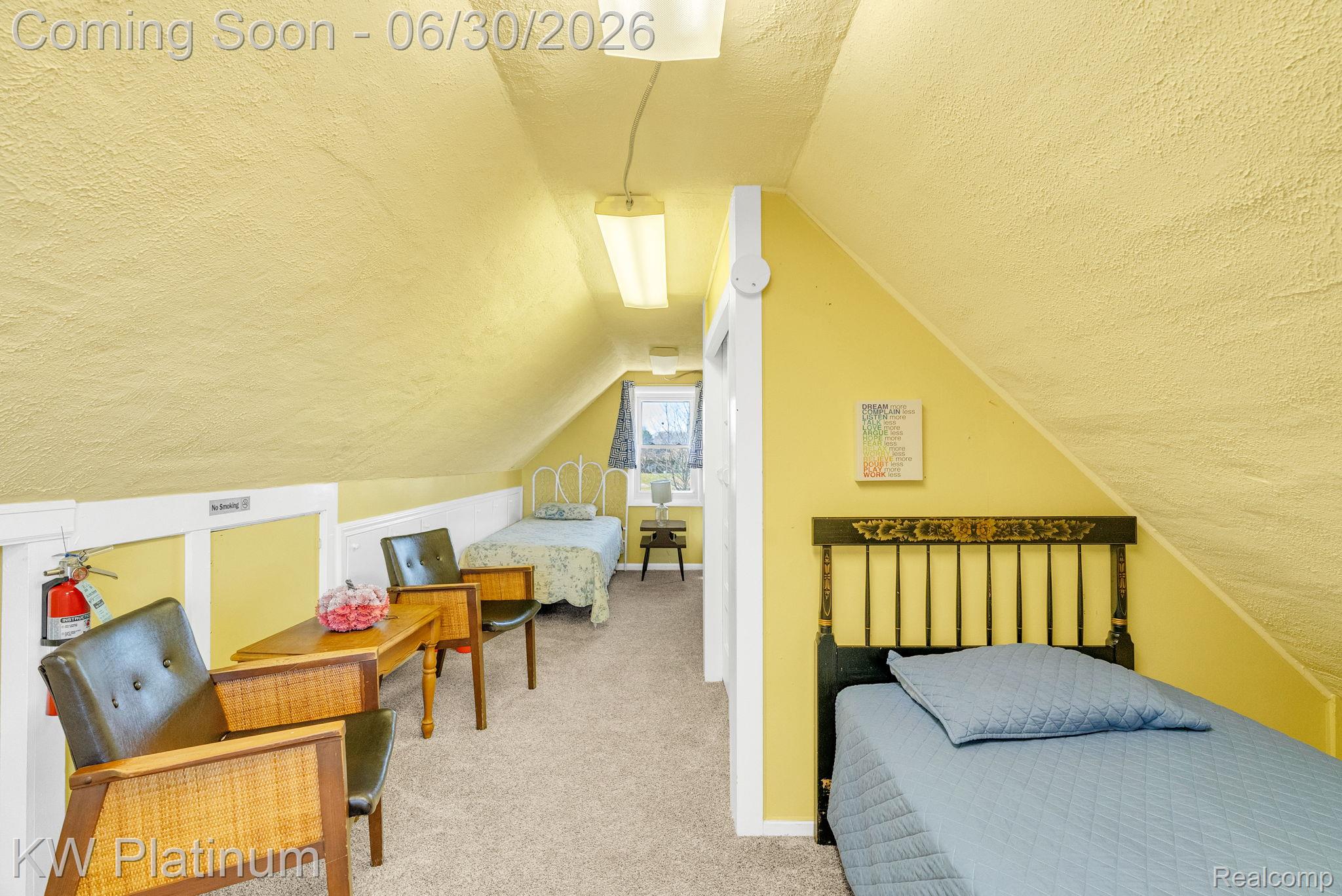 2235 South Lake Shore Road Harbor Beach, MI 48441 - Photo 75 of 99 Carpeted room with sloped ceilings, white baseboards, and a window providing natural light