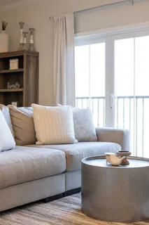 a spacious bedroom with a bed and a fireplace