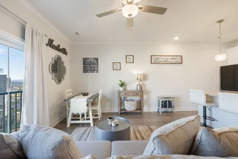 a bedroom with a bed and a shower