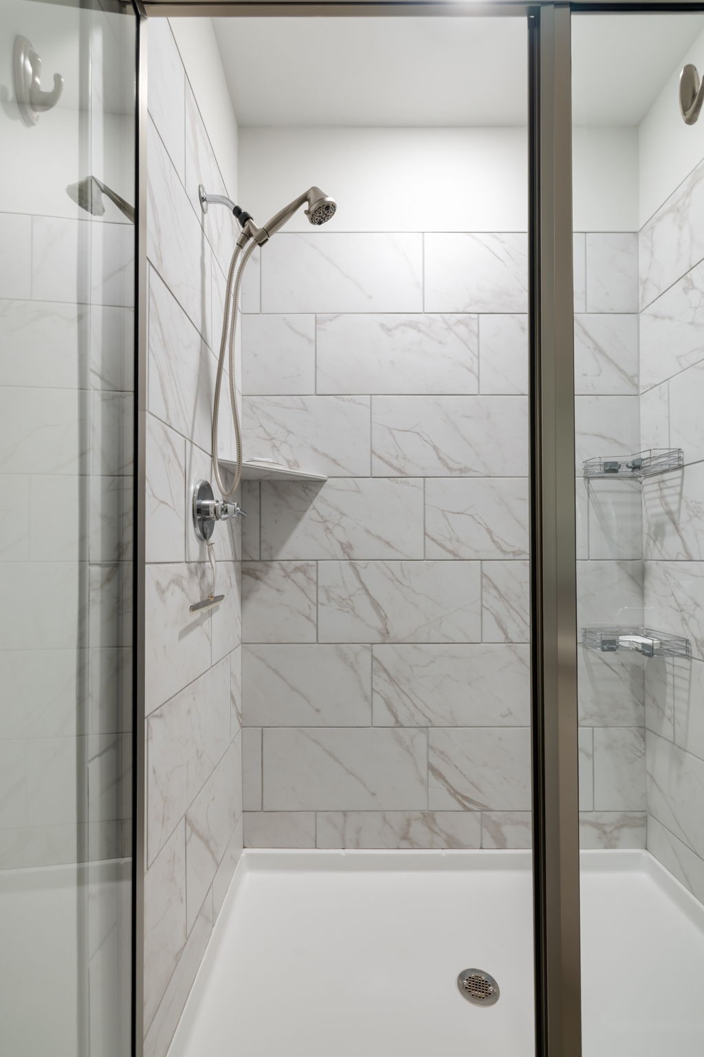 4018 Orsman Lane Antioch, TN 37013 - Photo 37 of 75 a bathroom with a glass shower door