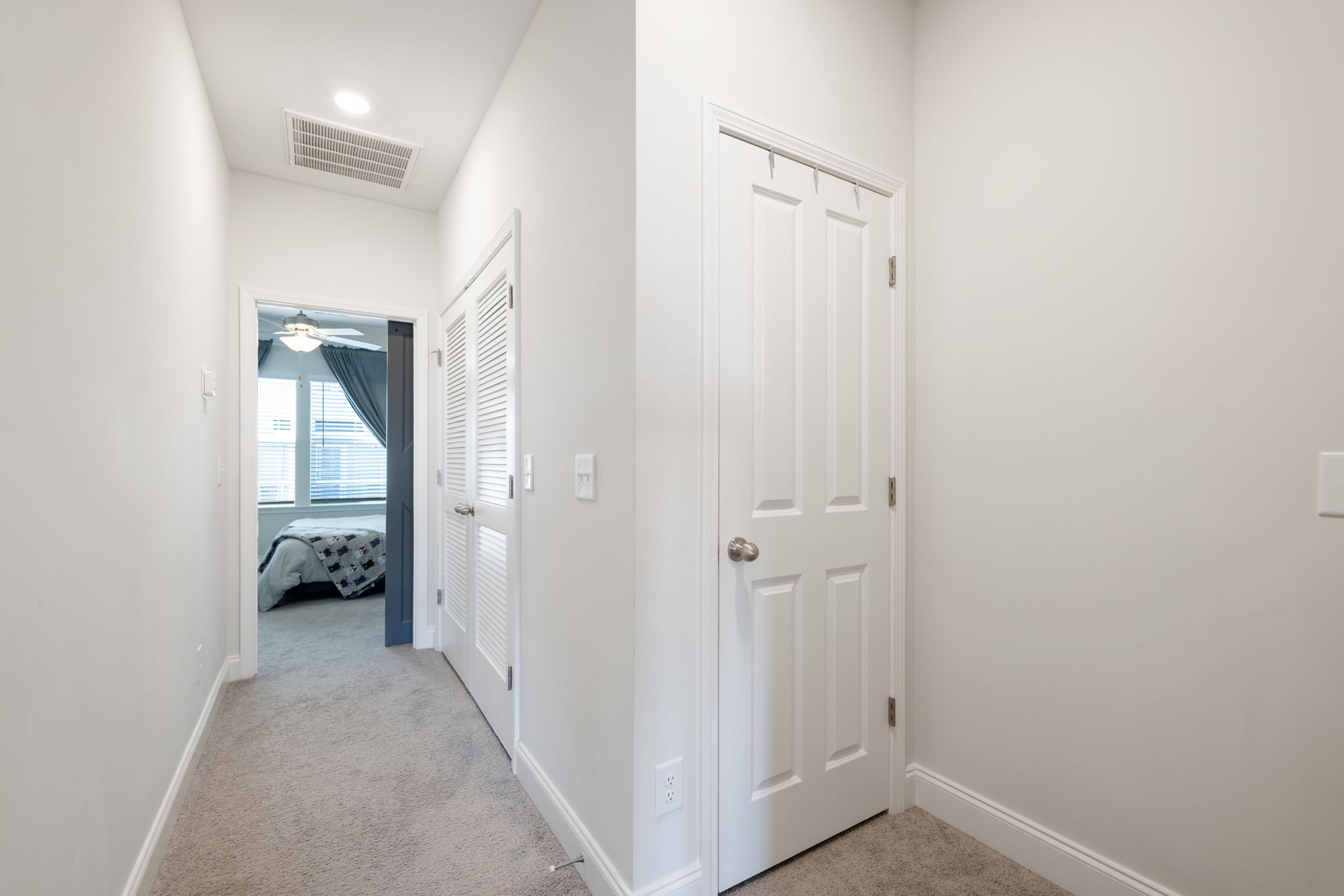 4018 Orsman Lane Antioch, TN 37013 - Photo 39 of 75 a view of a hallway with wooden floor and a bathroom