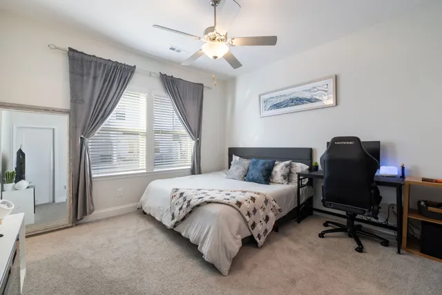 a bathroom with a sink vanity and mirror