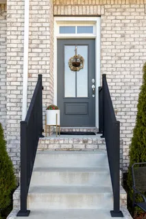 a view of a patio with a yard