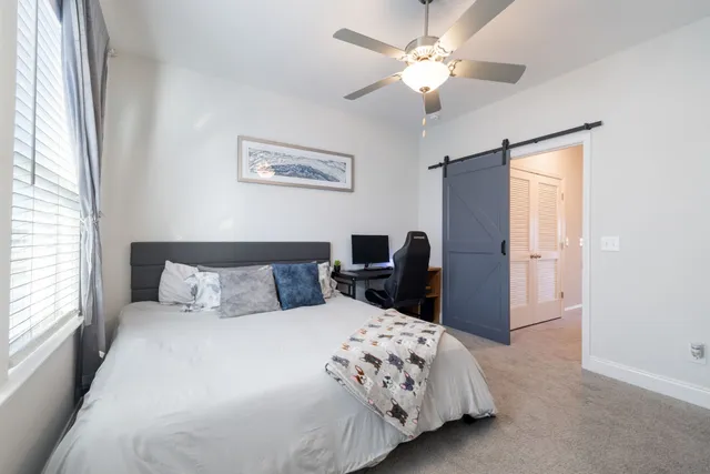 a front view of a building with many windows