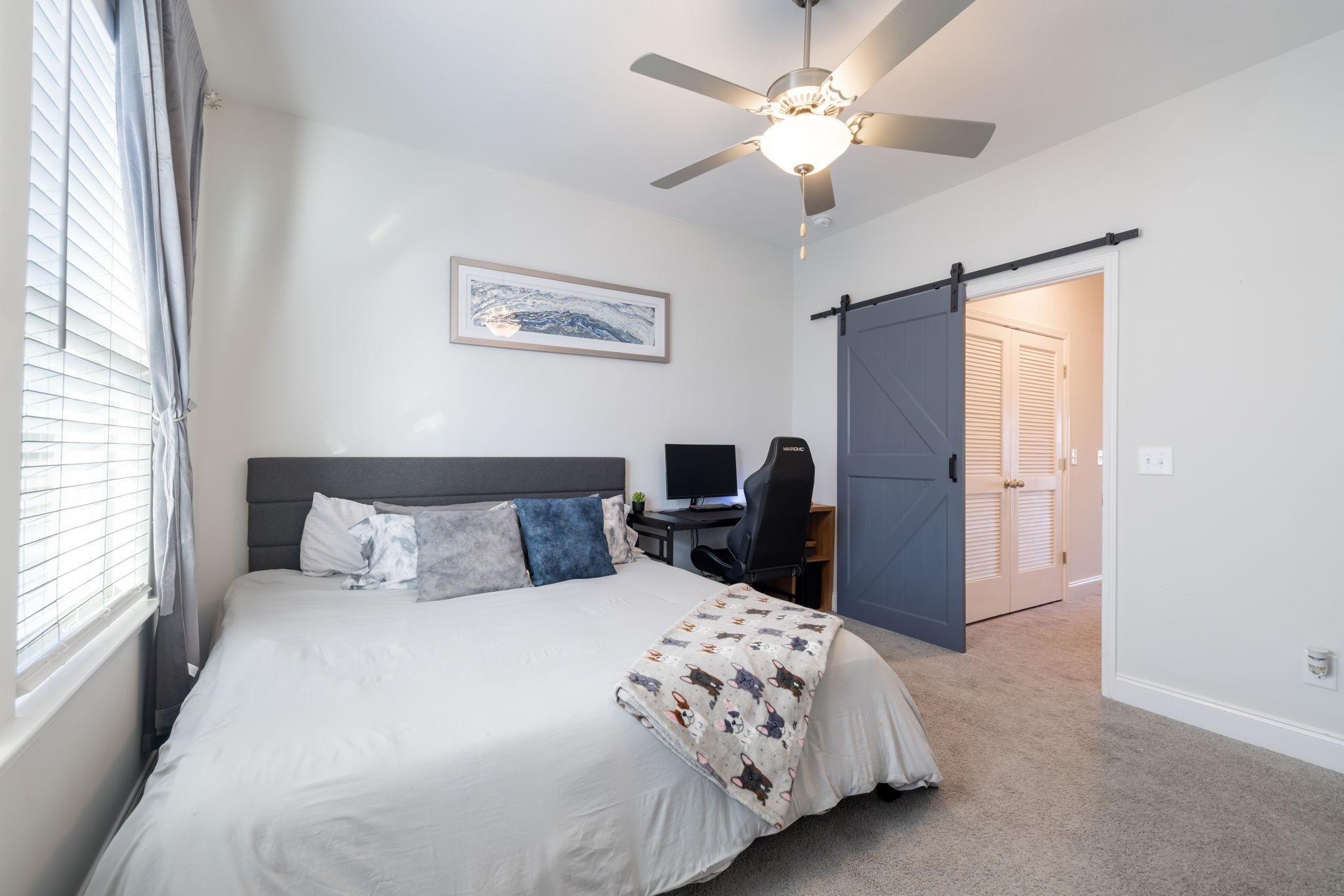 4018 Orsman Lane Antioch, TN 37013 - Photo 41 of 75 a bedroom with a bed and a chandelier