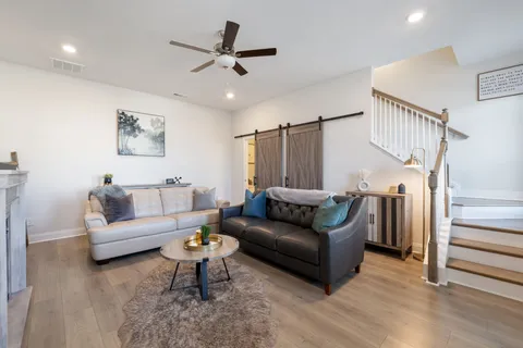 a view of a town with mountains in the background