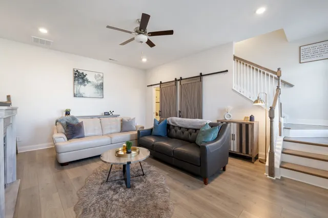 a view of a town with mountains in the background