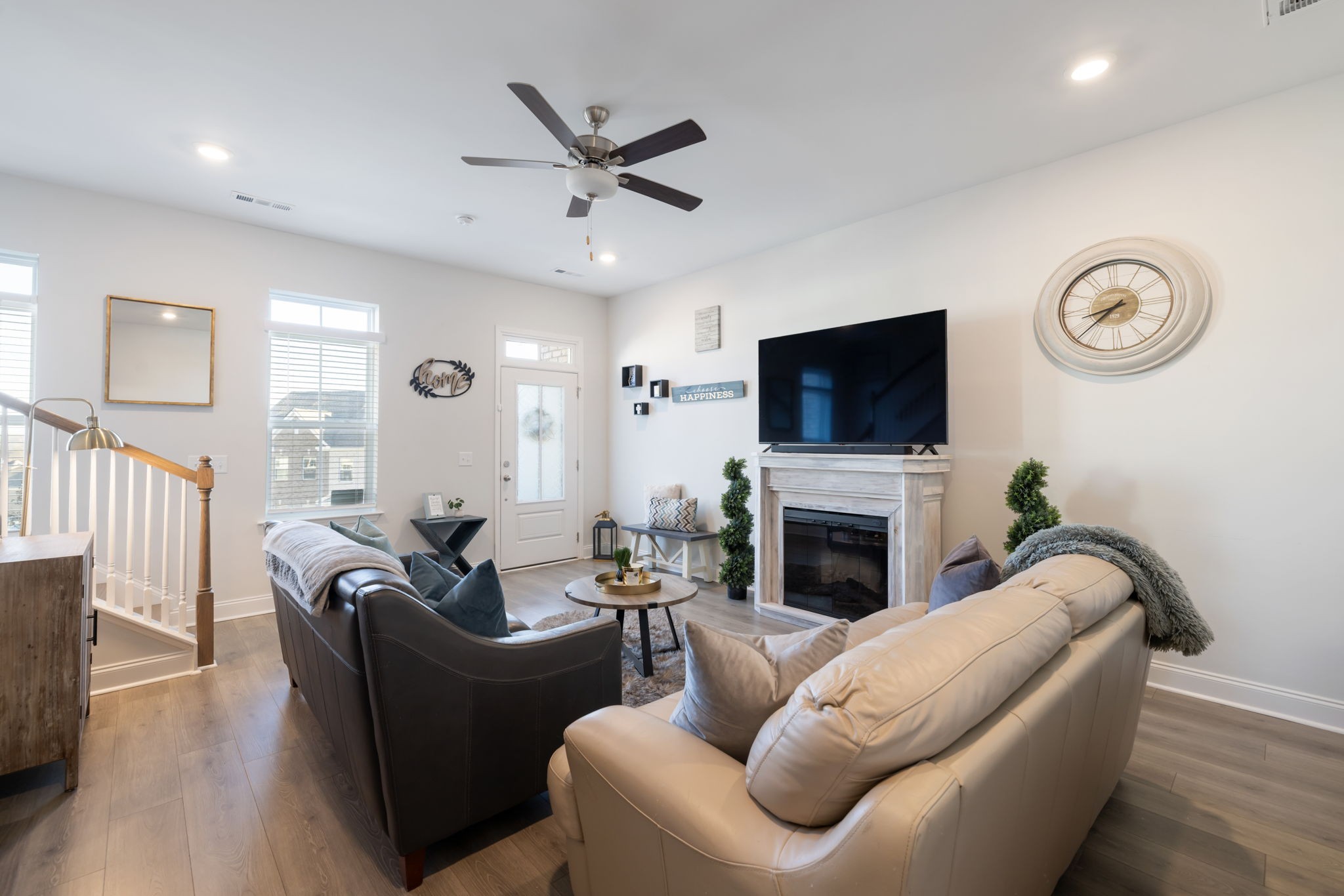 4018 Orsman Lane Antioch, TN 37013 - Photo 50 of 75 a living room with furniture a fireplace and a flat screen tv