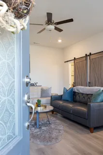 a kitchen with stainless steel appliances granite countertop a sink and a stove