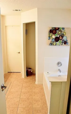 a bathroom with a sink and a shower