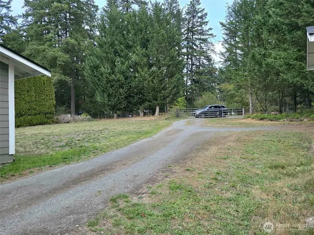 a view of backyard with green space