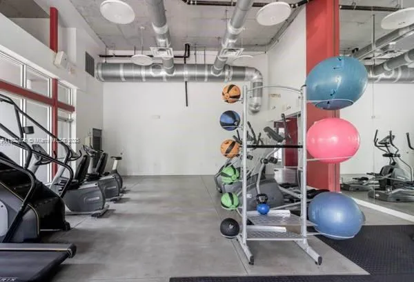 a view of a room with gym equipment