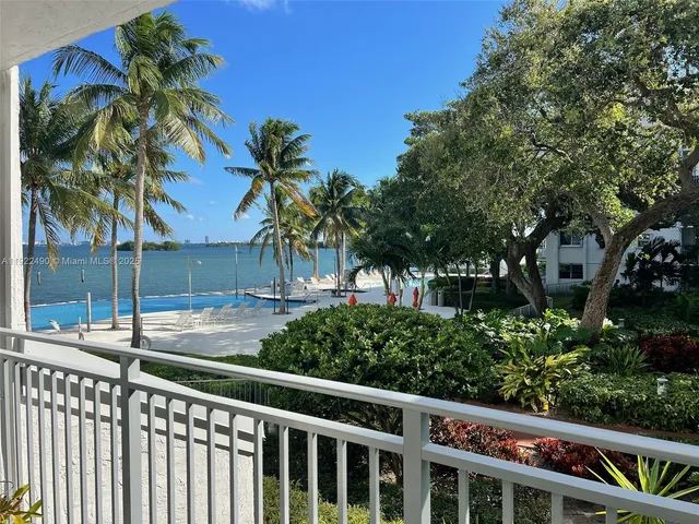 a view of a wooden floor and chairs