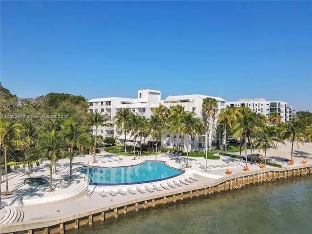 an aerial view of a house with outdoor space