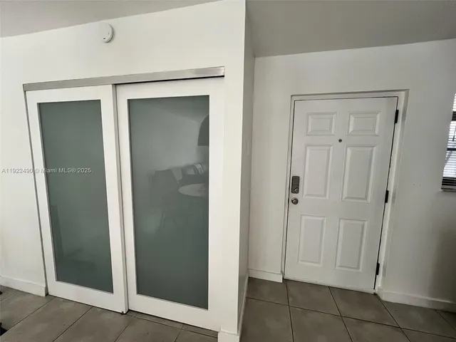 a bathroom with a sink a mirror and a shower