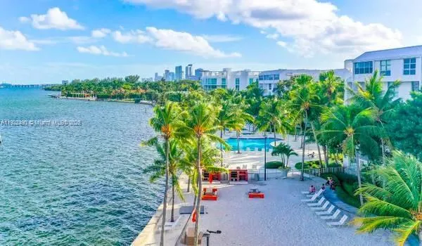 a balcony with palm trees
