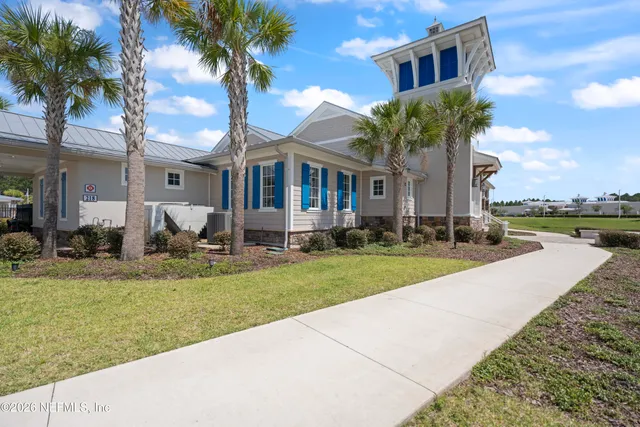a view of multiple houses with outdoor space