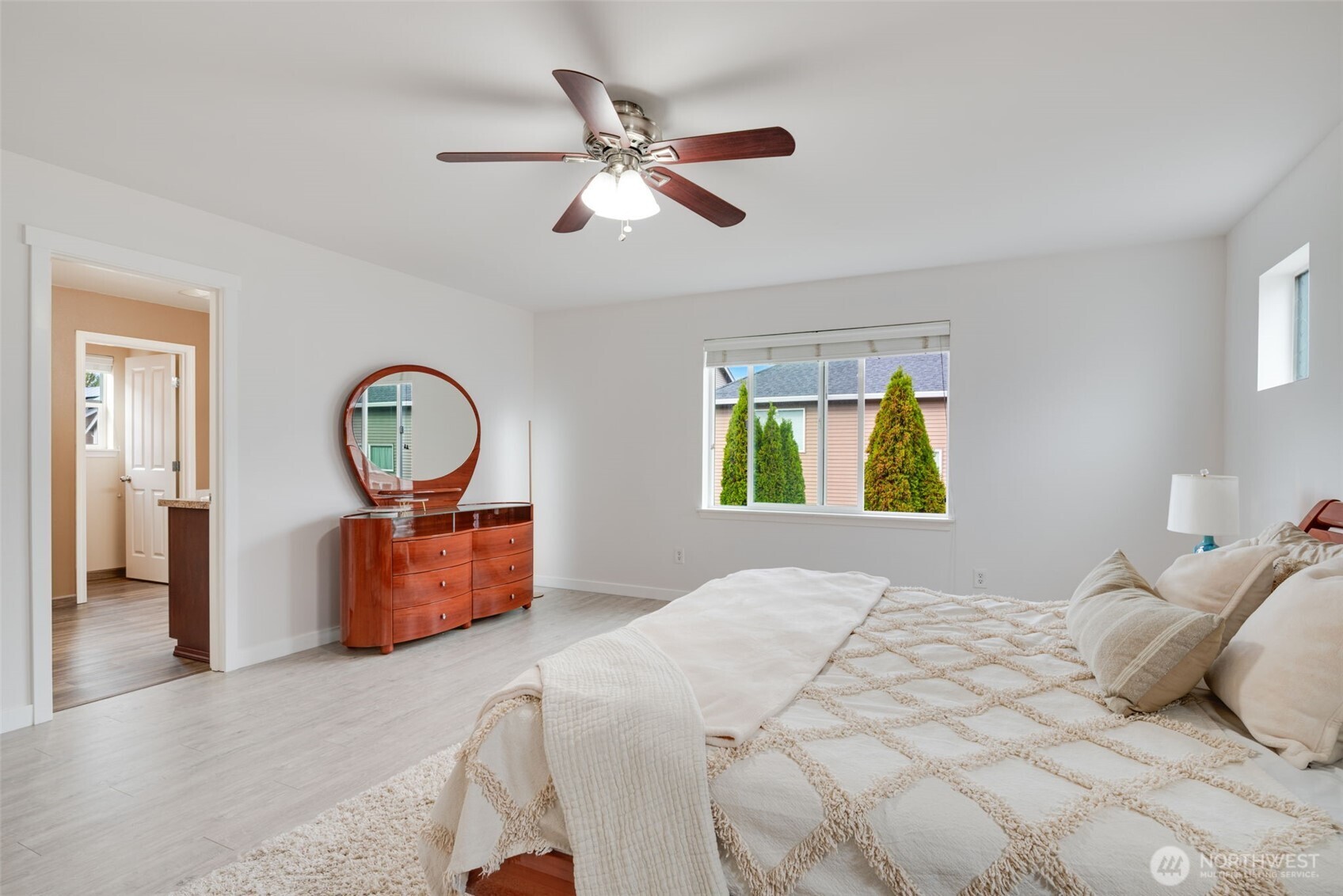 17026 Southeast 263rd Street Covington, WA 98042 - Photo 20 of 40 a bedroom with a bed and a window