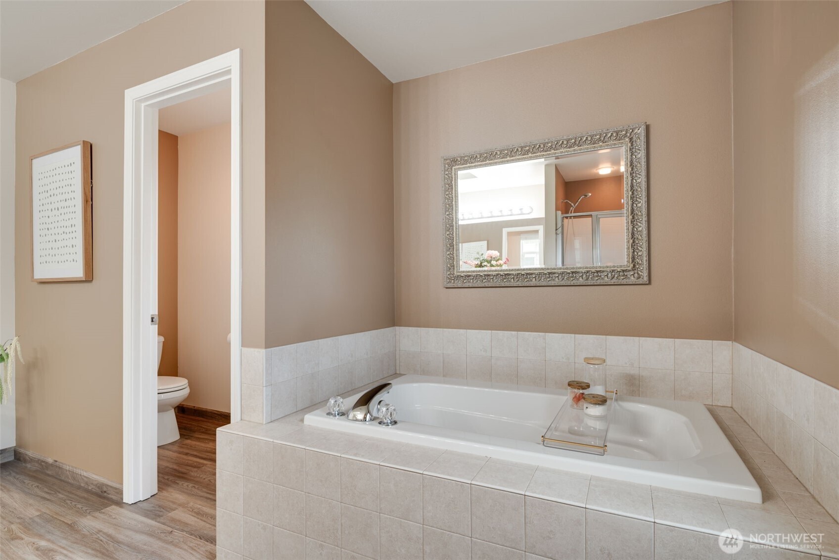 17026 Southeast 263rd Street Covington, WA 98042 - Photo 23 of 40 a bath tub sitting next to a white sink
