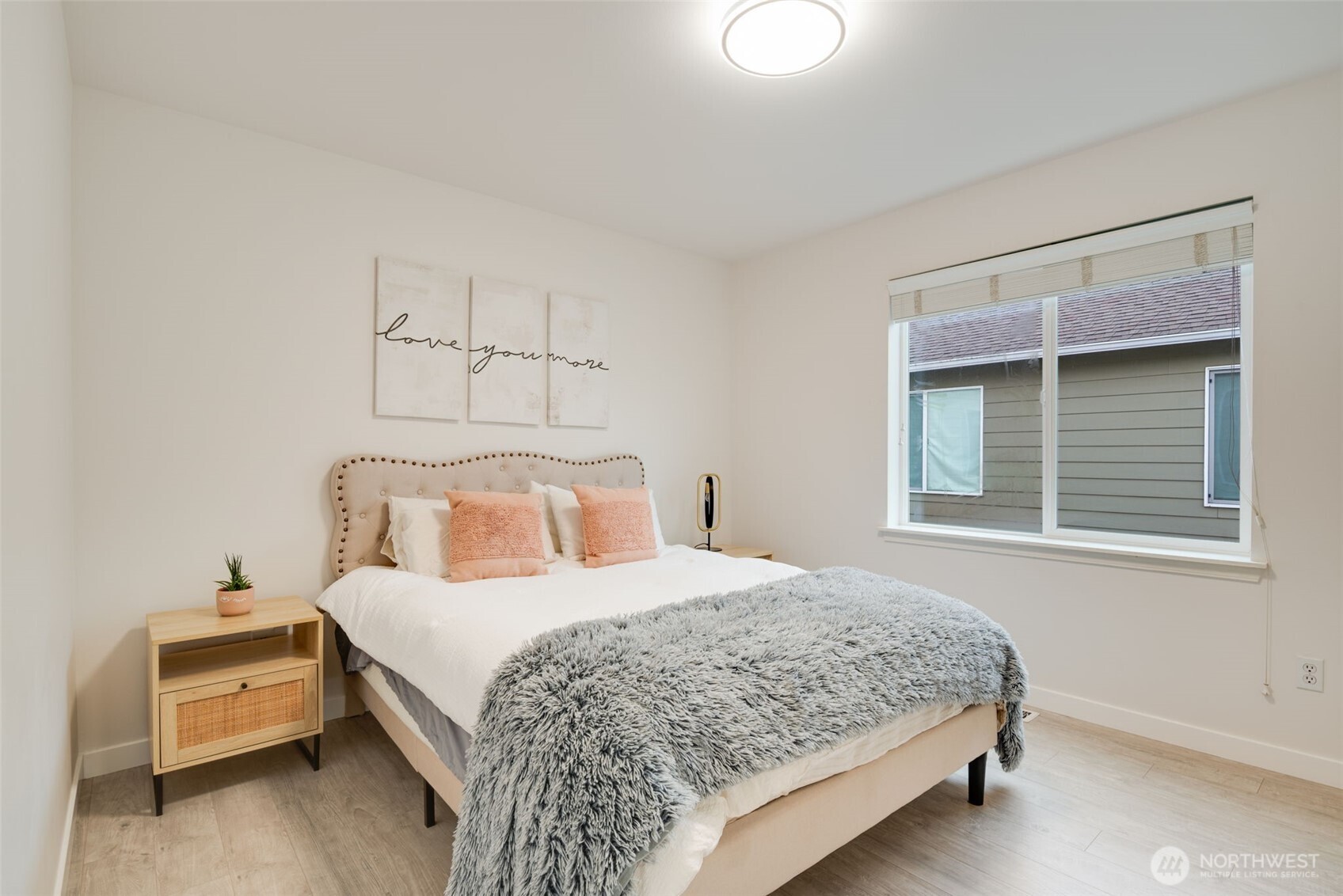 17026 Southeast 263rd Street Covington, WA 98042 - Photo 27 of 40 a bedroom with a bed and window