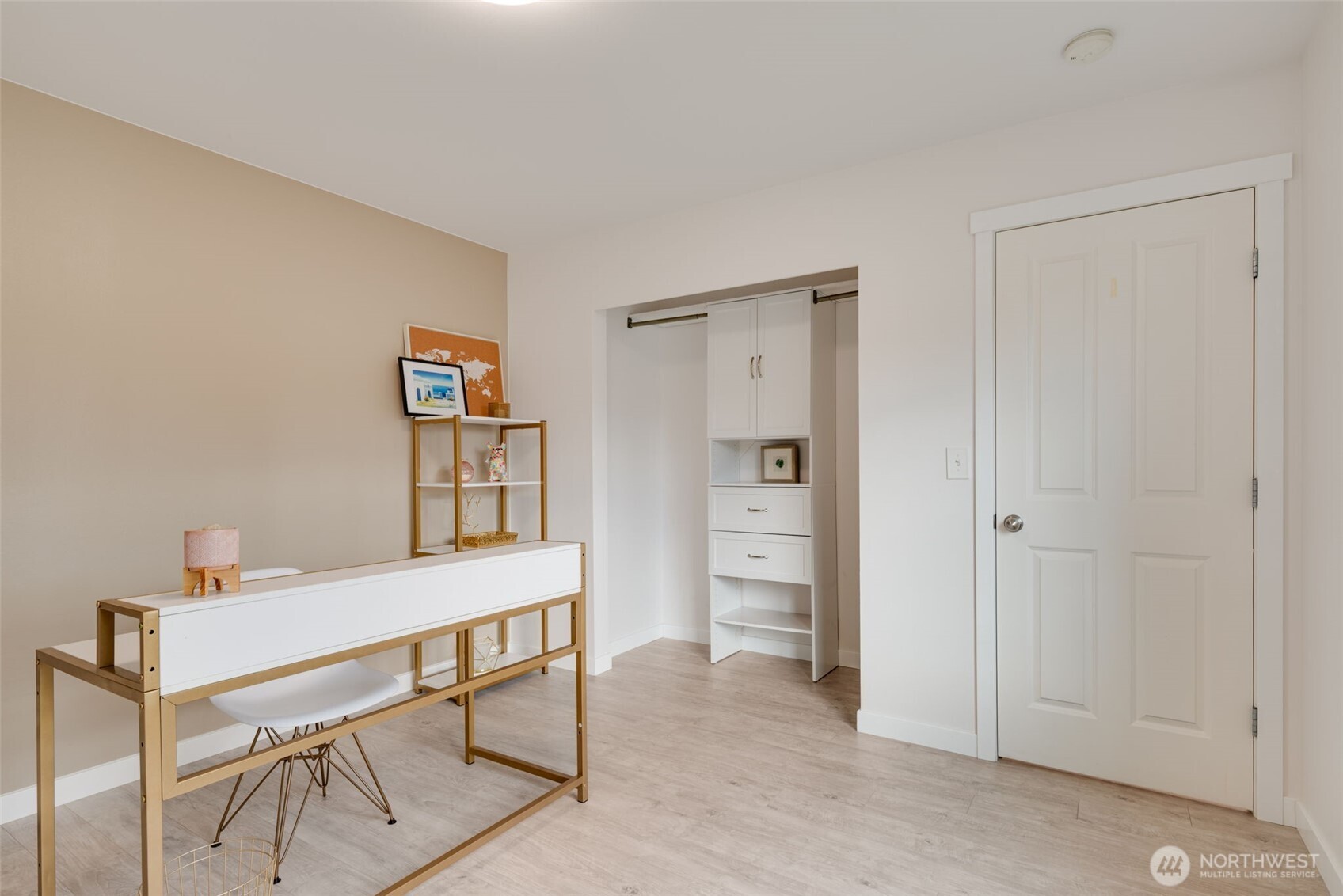 17026 Southeast 263rd Street Covington, WA 98042 - Photo 28 of 40 a workspace with furniture and closet