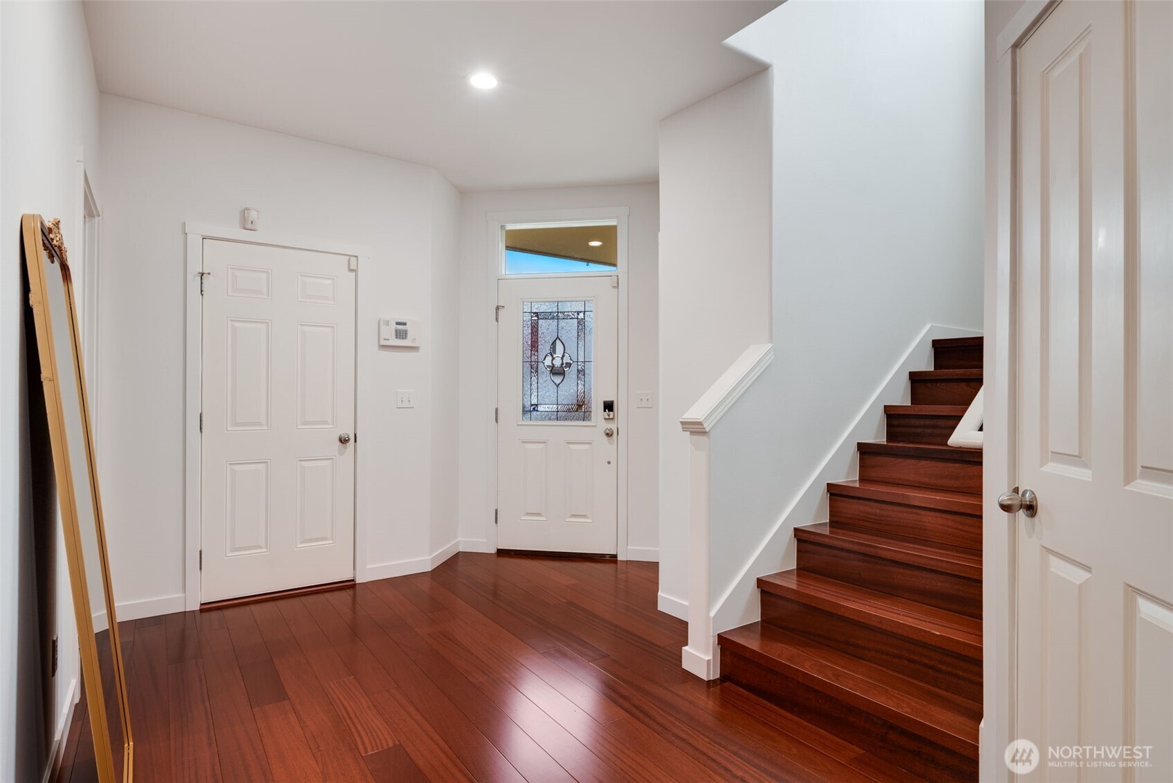 17026 Southeast 263rd Street Covington, WA 98042 - Photo 3 of 40 a view of entryway with wooden floor