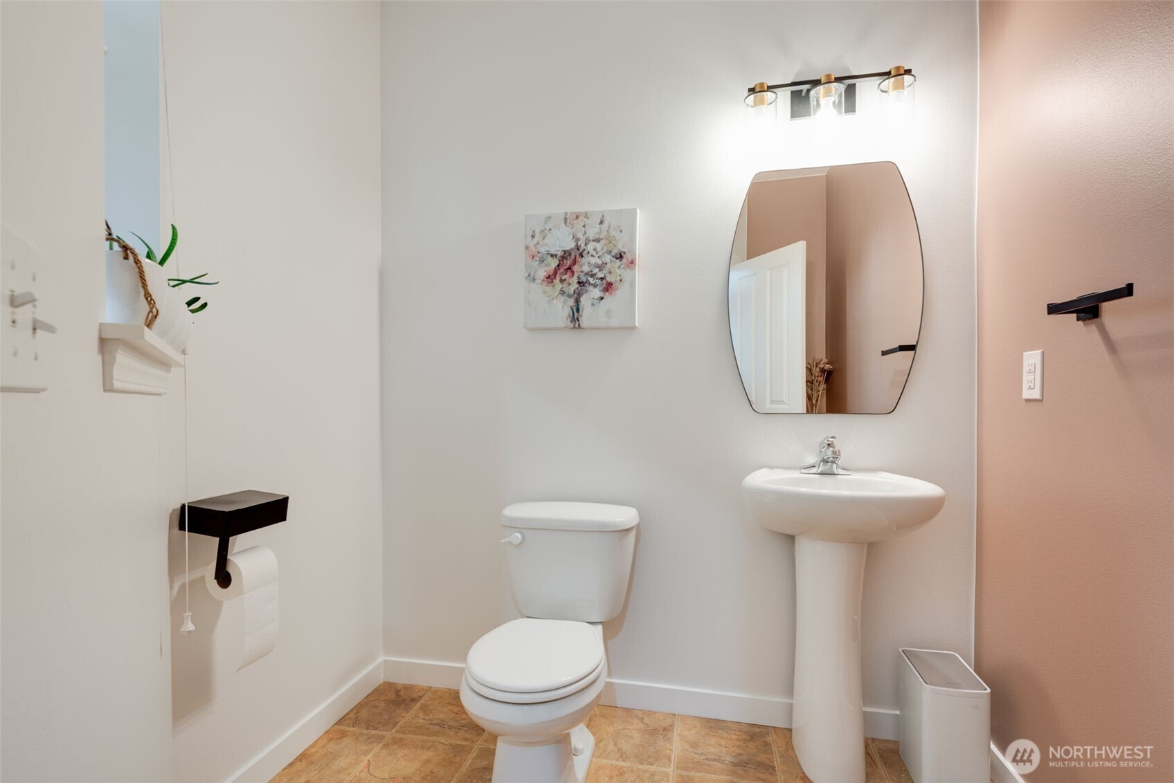 17026 Southeast 263rd Street Covington, WA 98042 - Photo 32 of 40 a bathroom with a toilet sink and mirror