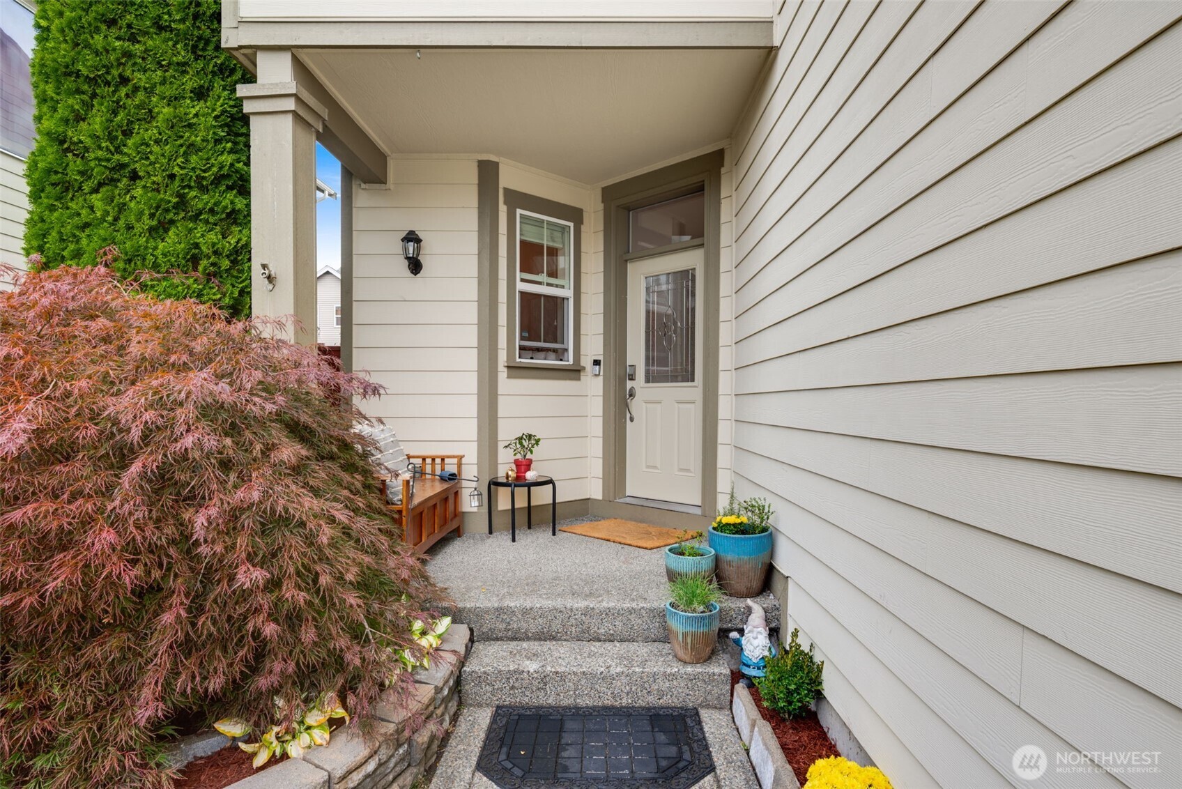 17026 Southeast 263rd Street Covington, WA 98042 - Photo 35 of 40 a view of porch with outdoor seating