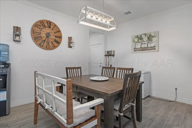 a kitchen with cabinets appliances a sink and a counter top space
