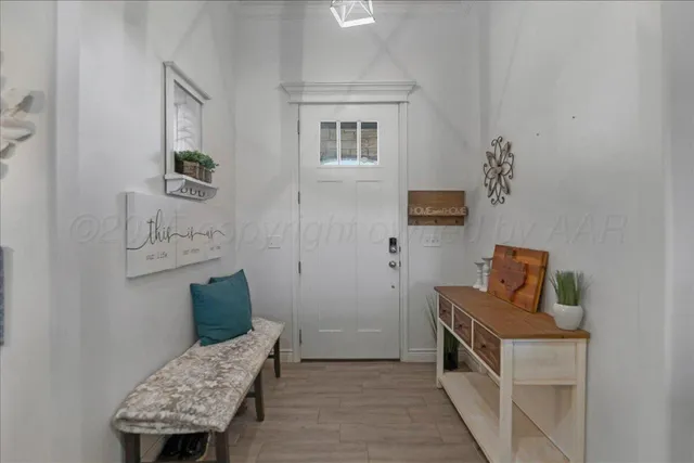 a kitchen with granite countertop a sink stainless steel appliances and cabinets