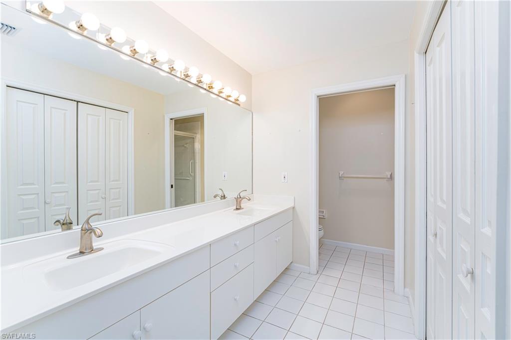 3988 Reflection Court Naples, FL 34109 - Photo 20 of 50 Mater Bathroom
