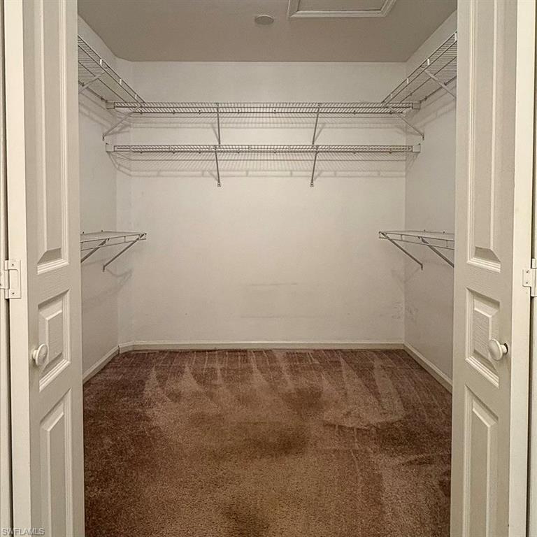 3988 Reflection Court Naples, FL 34109 - Photo 23 of 50 Master Bedroom Walk In Closet