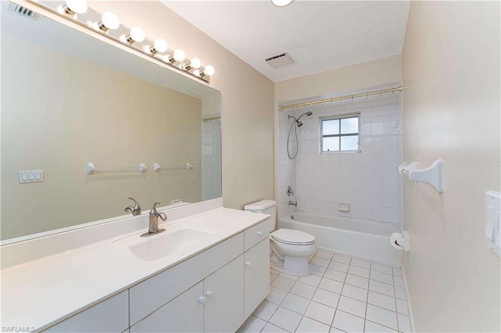 3988 Reflection Court Naples, FL 34109 - Photo 25 of 50 Main Bathroom with Tub/Shower combo