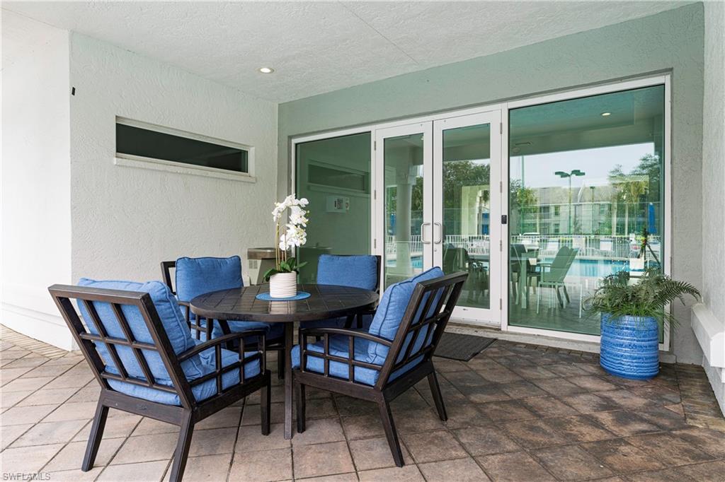 3988 Reflection Court Naples, FL 34109 - Photo 48 of 50 Community Pool Patio Area